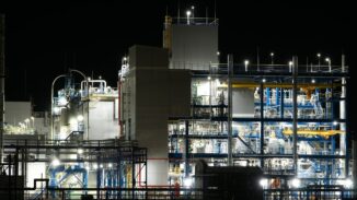 File photograph: industrial plant at night, not Nutrien or Point Lisas. Photograph date unknown.