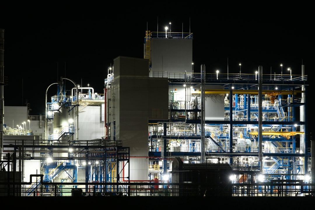 File photograph: industrial plant at night; not Nutrien or Point Lisas. Photograph date unknown.