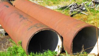 Water-main pipe in a 30 April 2011 file photograph by John MacKenzie; infrastructure context, not WASA works.